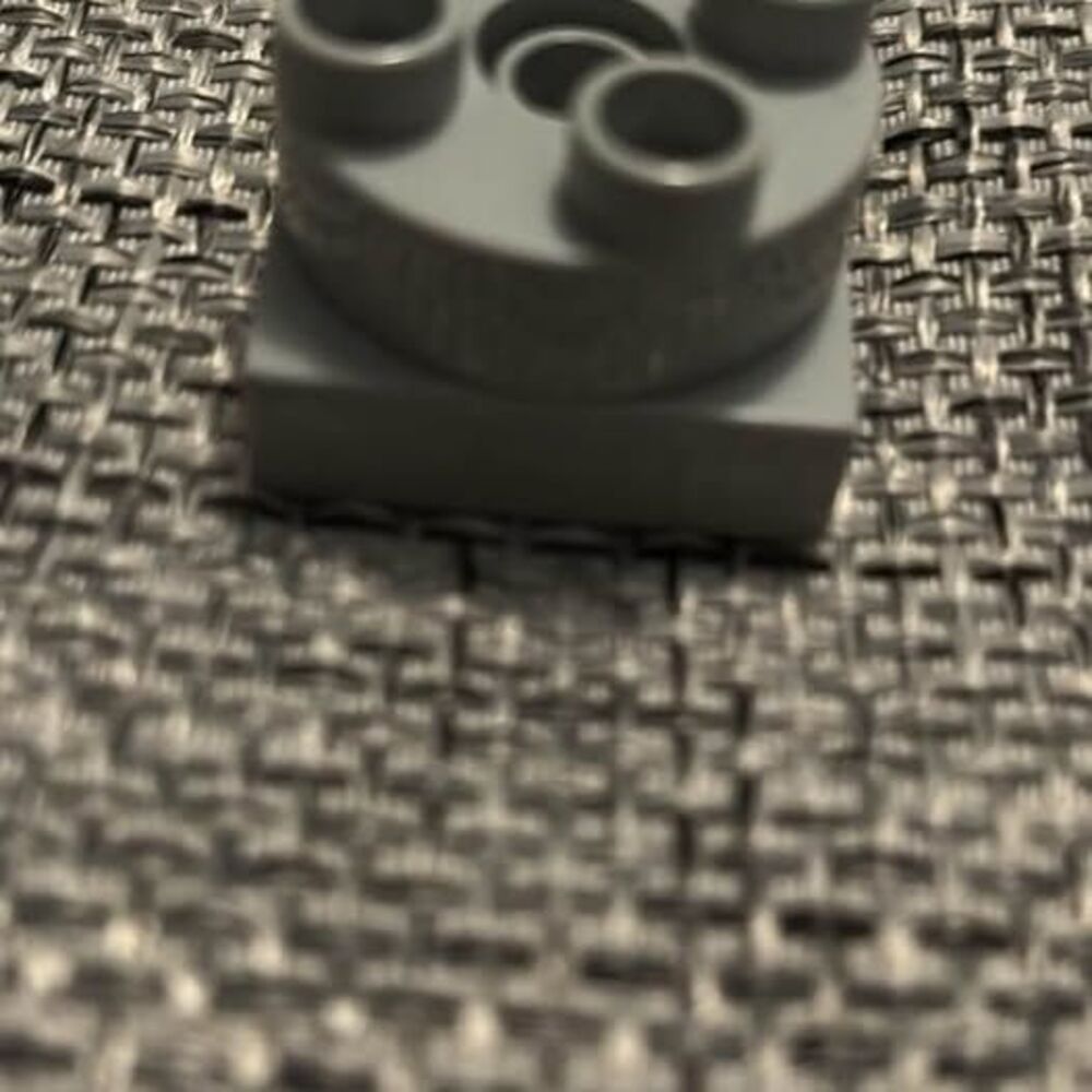Lego Duplo turntable swivel features a gray round rotating top.